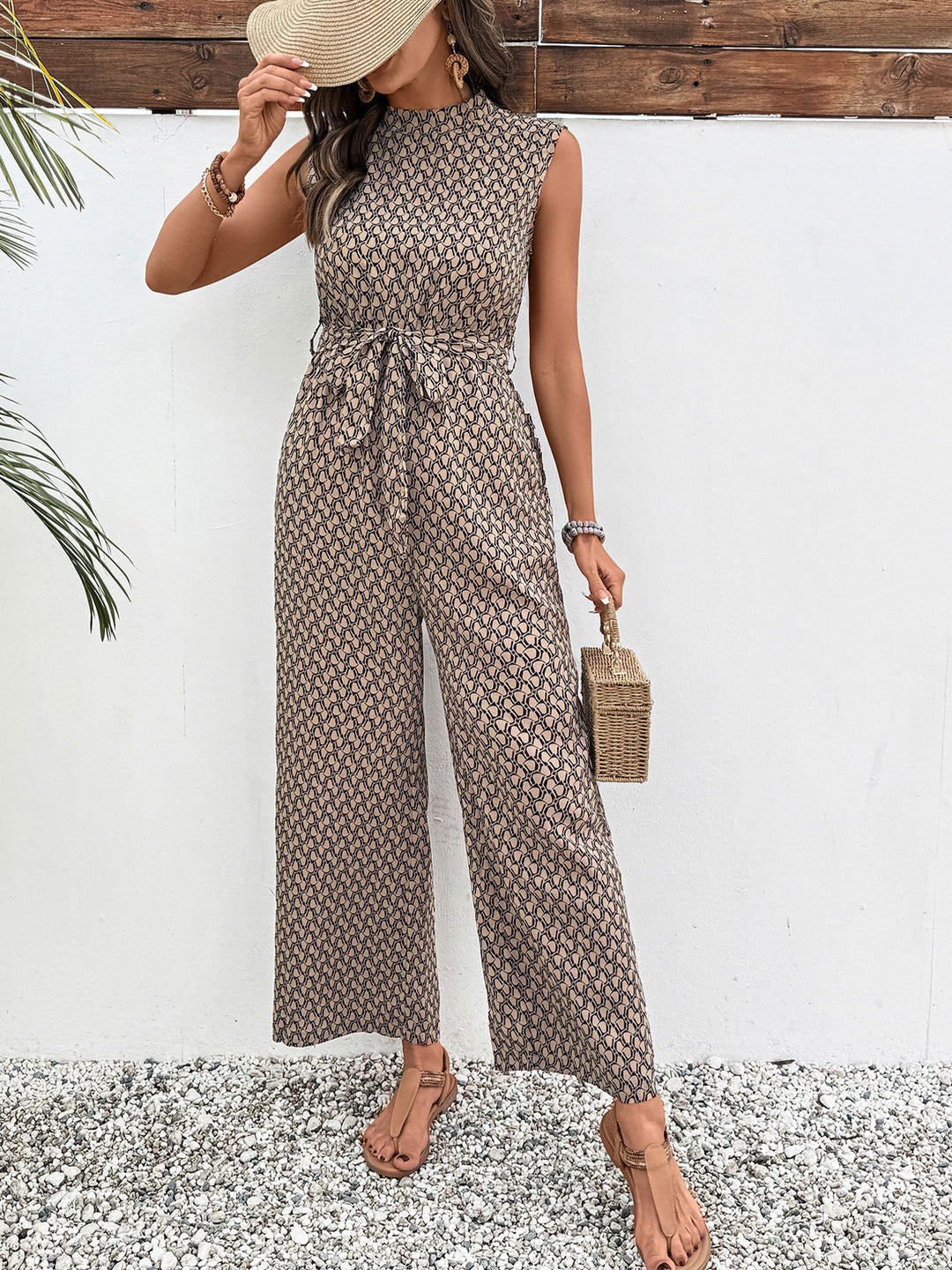 Mouwloze Jumpsuit Met Print En Strik | Elegant & Zomers