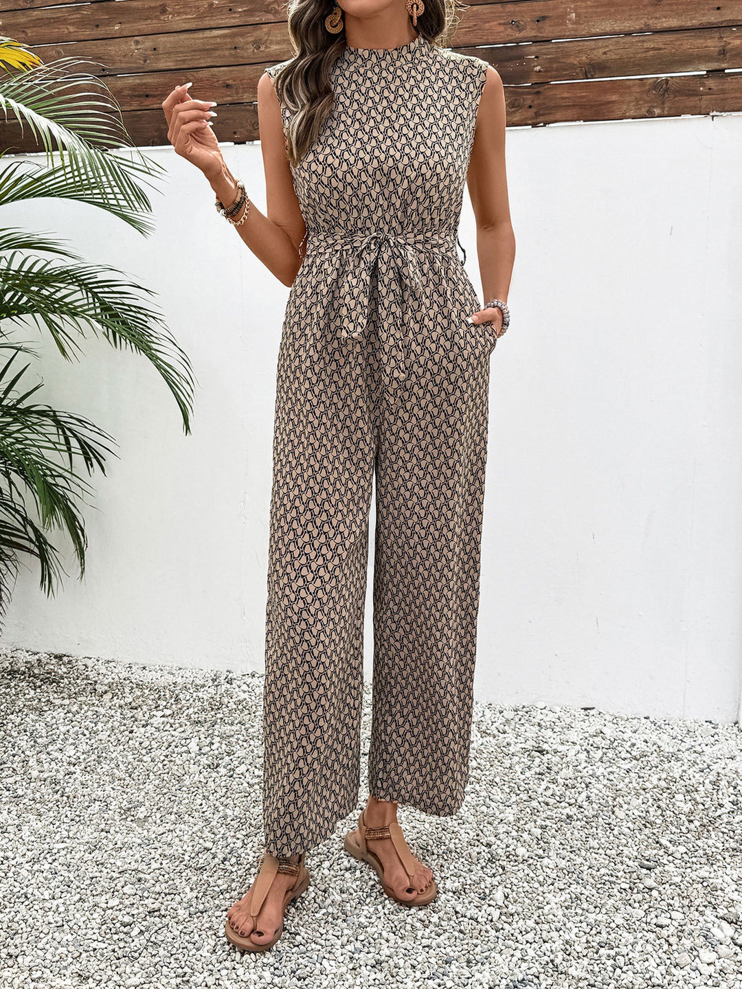 Mouwloze Jumpsuit Met Print En Strik | Elegant & Zomers